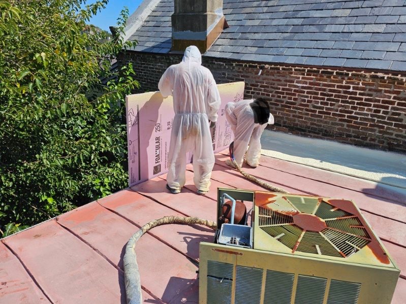 Tides Team crew working on a roof repair